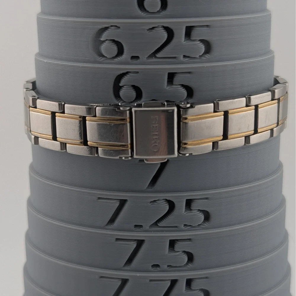 Seiko Solar V138-0AA0 Blue Sunburst Day/Date Two Tone Women's 25mm Watch